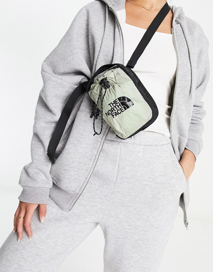 The North Face Bozer Cross Body Bag In Light Green