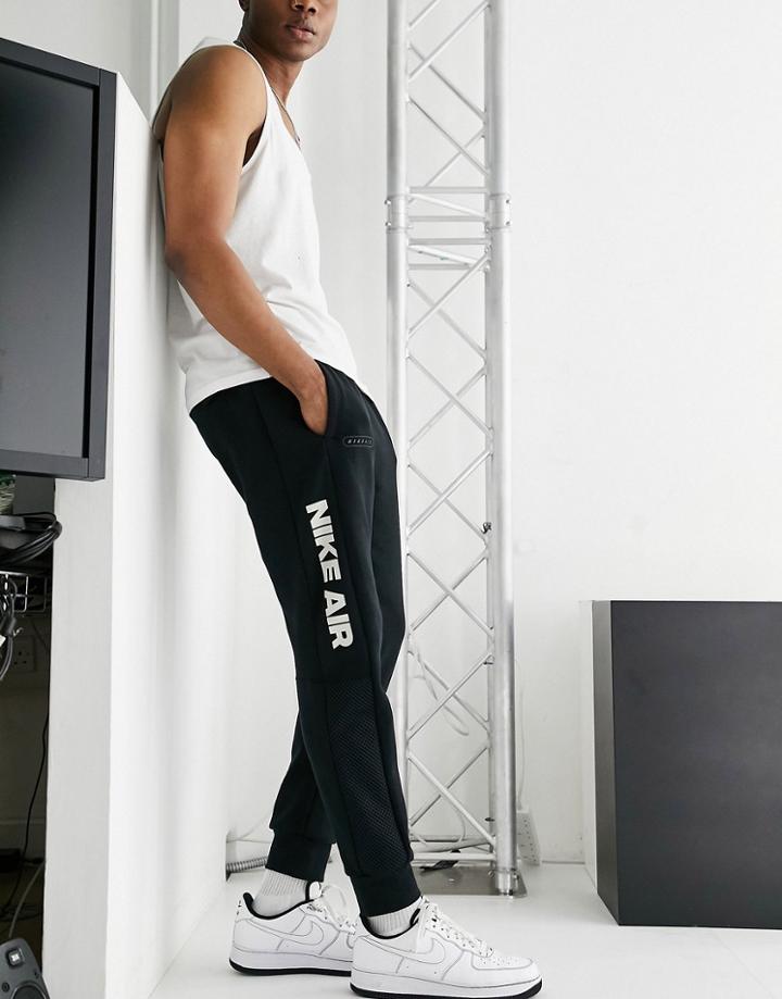 Nike Air Panelled Cuffed Fleece Sweatpants In Black