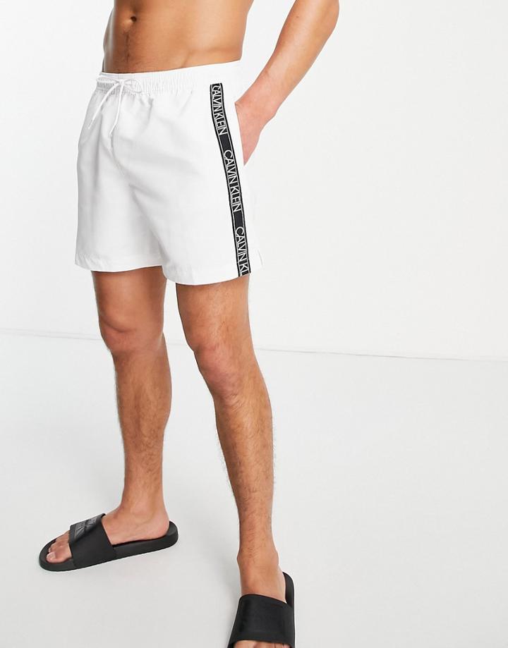 Calvin Klein Tape Logo Mid Length Swim Shorts In White