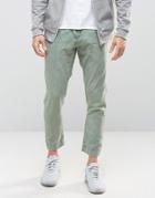 Asos Tapered Trousers In Khaki Acid Wash - Green
