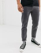 Asos Design Tapered Jeans In Retro Washed Black