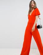 Asos Design Jumpsuit With Flutter Sleeve And Tie Back-orange