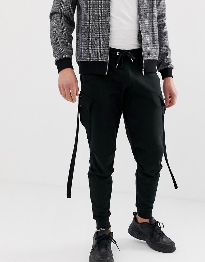 Asos Design Tapered Sweatpants With Cargo Pockets And Strapping-black