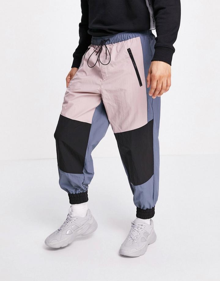 Asos Design Oversized Joggers In Nylon With Panels-multi