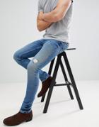 Asos Design Super Skinny Jeans In Dark Wash Blue With Abrasions - Blue