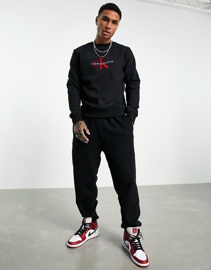 Calvin Klein Jeans Monogram Flock Logo Sweatshirt In Black