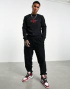 Calvin Klein Jeans Monogram Flock Logo Sweatshirt In Black