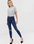 Asos Design Ridley High Waisted Skinny Jeans In Dark Wash Blue With Ripped Knee Detail