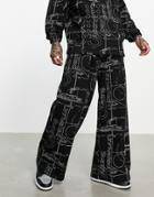 Asos Unrvlld Spply Wide Leg Sweatpants With All Over Graphic Print In Black - Part Of A Set-purple