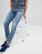 Asos Design Skinny Jeans In Mid Wash-blue