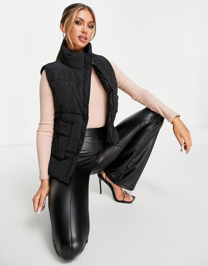 I Saw It First Sleeveless Padded Vest In Black