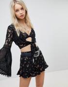 Kiss The Sky Tie Front Crop Top In Crochet Lace - Black