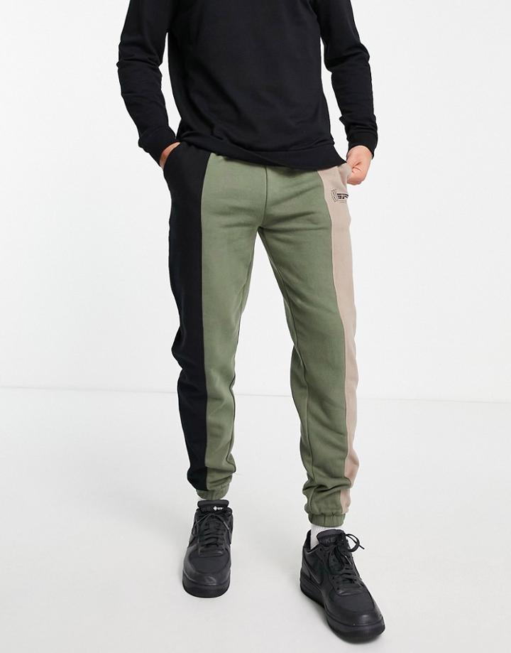 Good For Nothing Spliced Sweatpants In Black And Khaki With Mixed Logo Print-multi