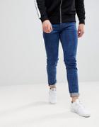 Asos Skinny Jeans In Retro Dark Wash With Raw Hem - Blue