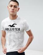 Hollister Iconic Applique Logo Acid Wash T-shirt In White - White