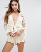 Kiss The Sky Lace Sleeve Romper With Tie Front And Ruffle Leg Details - Cream