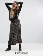 Reclaimed Vintage Peplum Hem Midi Skirt In Floral - Black