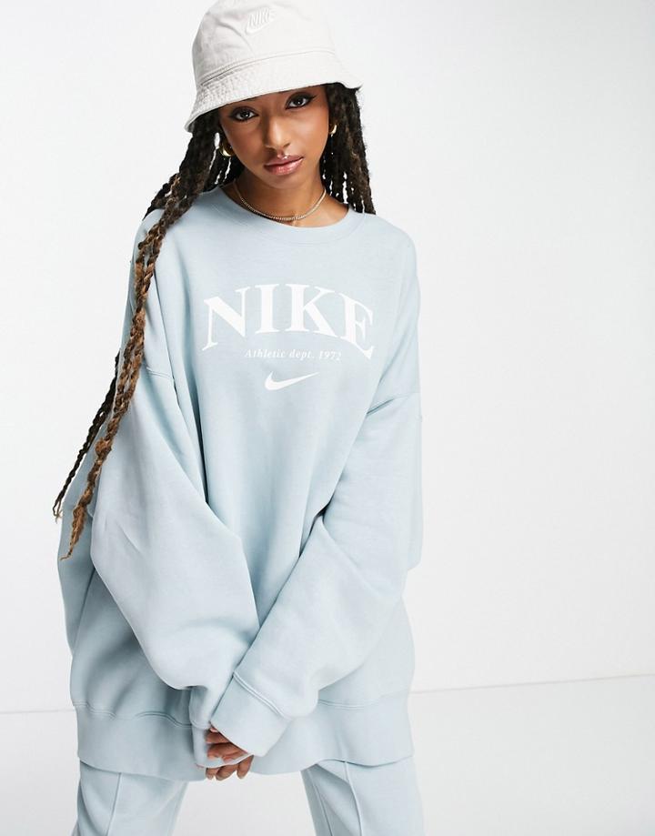 Nike Collegiate Logo Oversized Fleece Crew Neck Sweatshirt In Pale Blue