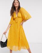 Asos Design Dobby Midi Dress With Lace Up And Fluted Sleeves In Mustard-yellow