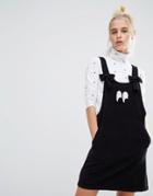 Lazy Oaf Bow Strap Eyeball Pinafore Dress In Corduroy - Black