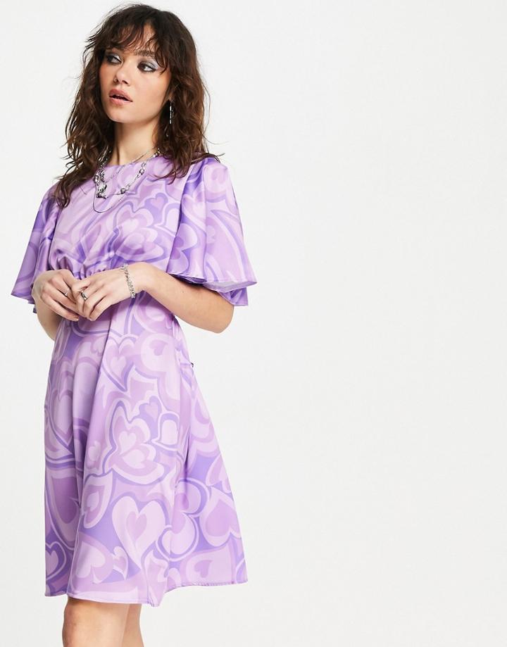 Twisted Wunder Flutter Sleeve Mini Dress In All Over Heart Print-purple