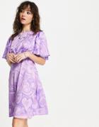 Twisted Wunder Flutter Sleeve Mini Dress In All Over Heart Print-purple
