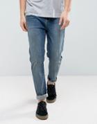 Asos Tapered Jeans In Mid Wash Blue - Blue