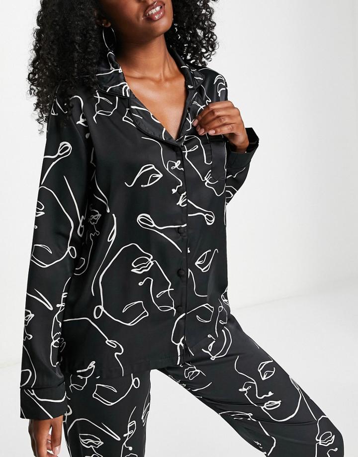 Bluebella Leon Satin Revere Top And Bottom Set In Mono Face Print-black