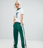 Adidas Originals Three Stripe Popper Pant With Vintage Logo In Green - Green