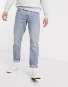 Asos Design Tapered Jeans With Dusty Tint-blues