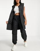 Rains Long Liner Tank Top In Black