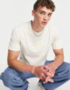Adidas Originals Debossed Logo T-shirt In Wonder White