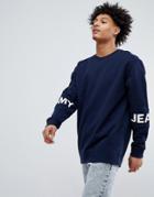 Tommy Jeans Essential Band Sleeve Logo Crewneck Sweatshirt In Navy - Navy