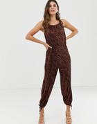 Asos Design Plisse Tie Cuff Balloon Leg Jumpsuit In Zebra Animal Print-multi