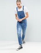 Asos Denim Overalls With Abrasions And Raw Hem In Mid Blue - Blue