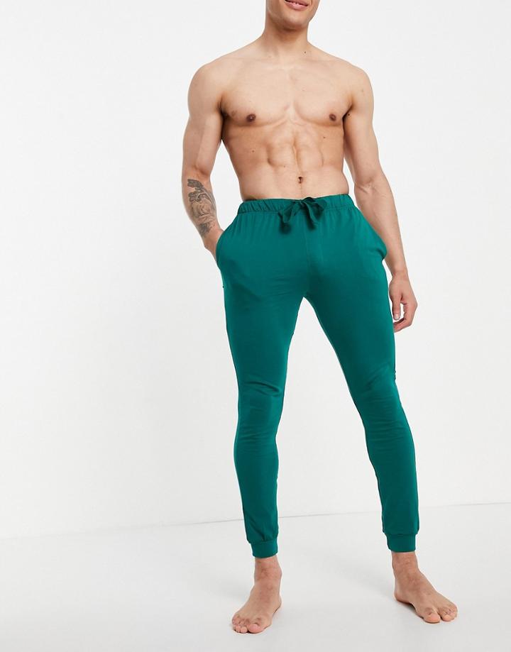 Asos Design Christmas Lounge Sweatpants In Green