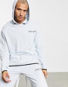 Asos Unrvlld Spply Set Oversized Hoodie With Rubber Logo-blue