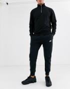 Nike Club Fleece Cuffed Sweatpants In Black