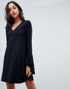 Asos Design Mini Shift Dress In Ponte With Long Sleeves And Frill Cuffs-black