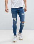 Asos Extreme Super Skinny Jeans With Open Rips In Mid Blue - Blue