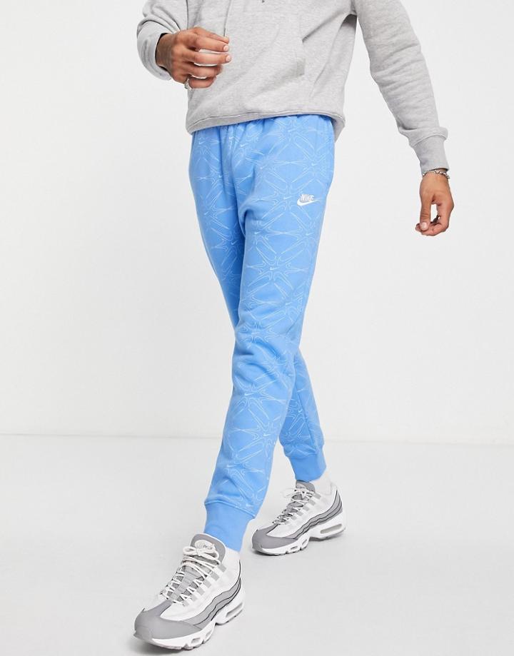 Nike Branded Aop Pack Cuffed Fleece Sweatpants In Blue-blues