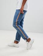 Asos Design Slim Jeans In Mid Wash Blue With Rainbow Stripe