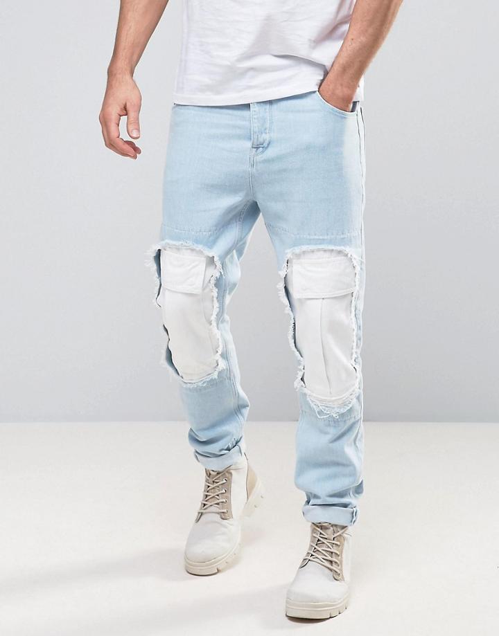 Asos Tapered Jeans In Bleach Blue With Cargo Rip Detail - Blue