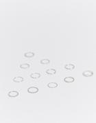 Asos Design Pack Of 12 Rings In Mixed Texture And Twist Designs In Silver Tone
