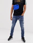 Diesel Tepphar X Slim Carrot Fit Rip And Repair Jeans In 0890x Mid Wash-blue