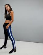 Puma T7 Track Pants In Black With Blue Stripe In Black - Black
