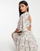 Love Triangle Flutter Sleeve Romper In Spring Floral-multi