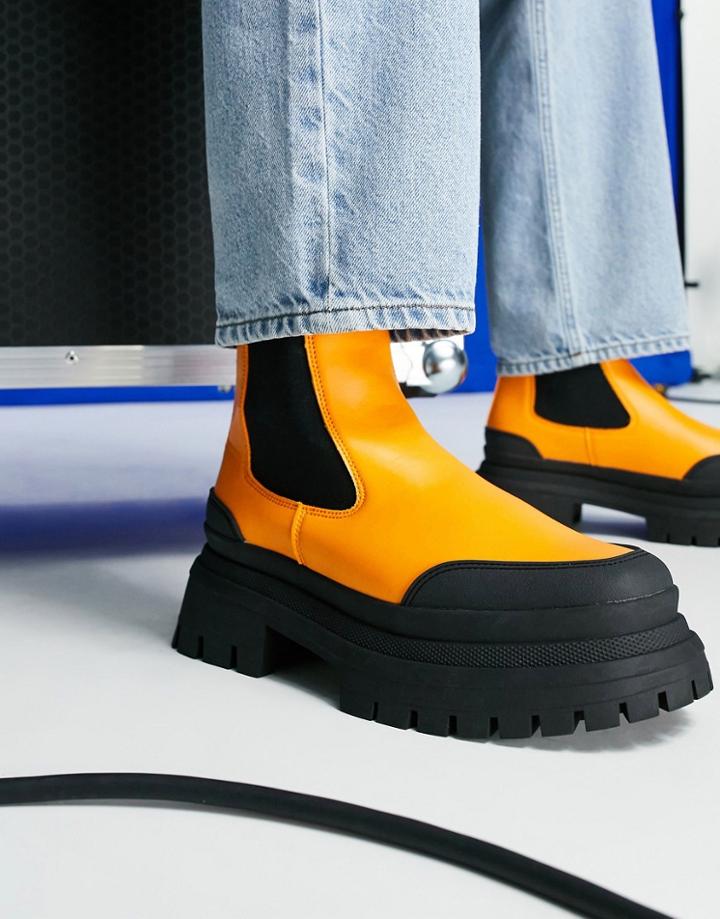 Asos Design Chunky Sole Calf Chelsea Boot In Orange Faux Leather With Contrast Sole