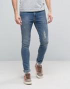 Asos Super Skinny Jeans With Rips And Abrasions In Vintage Mid Wash - Blue
