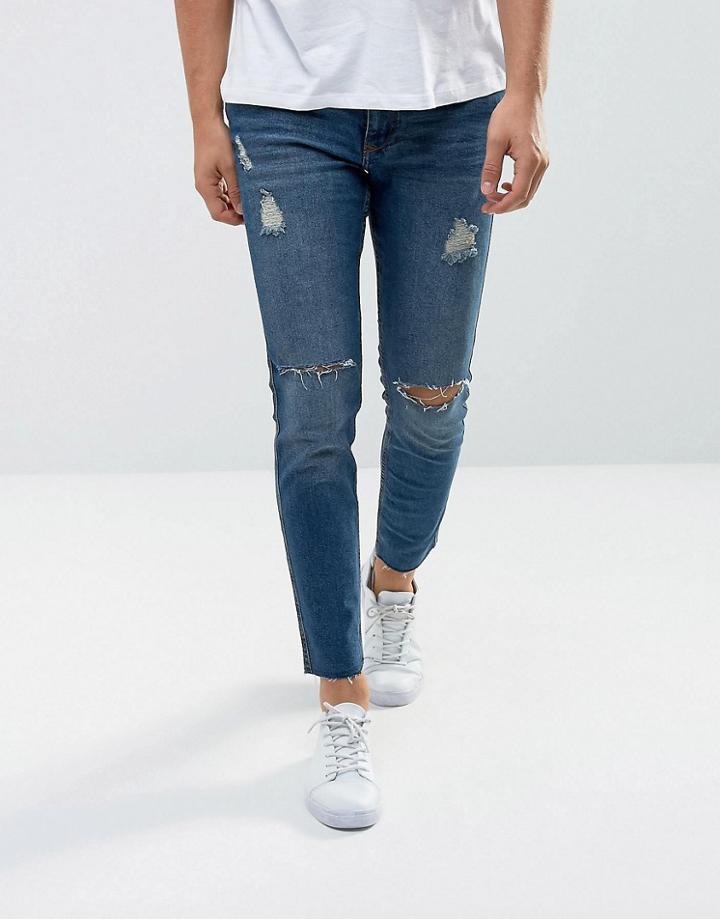 Mango Man Ripped Skinny Jeans With Raw Hem In Mid Wash - Blue